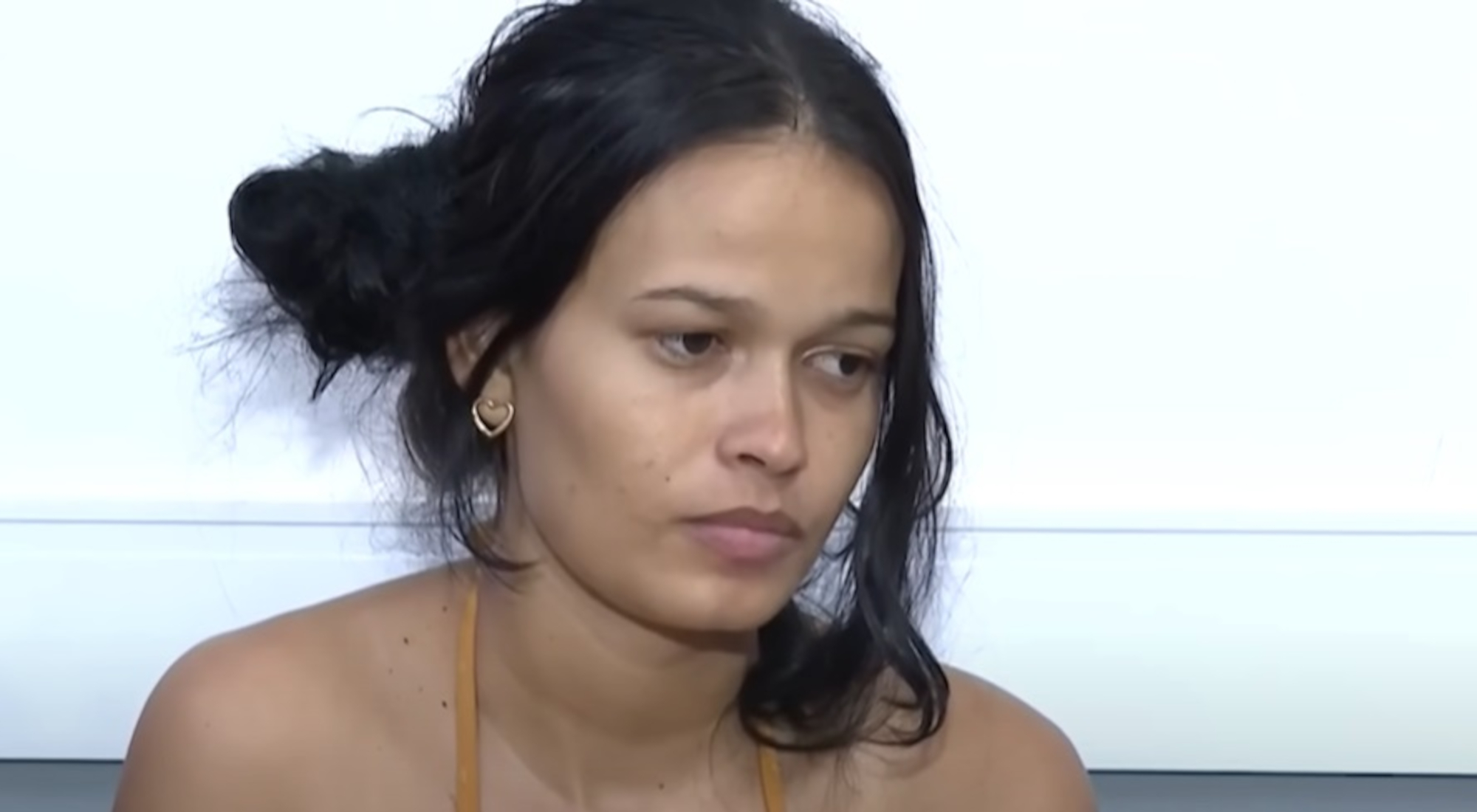 Picture shows the mother Eduarda Silva de Oliveira, undated. She gave five different versions about what happened. Note: Image is a screenshot from video. Eduarda Silva de Oliveira