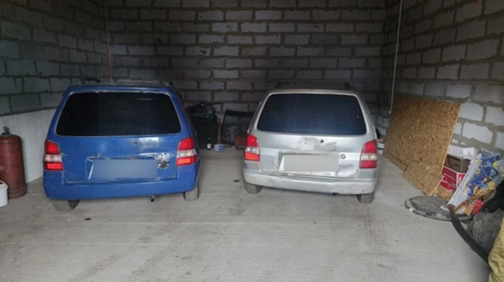 Picture shows the cars used in the robberies, undated. Father and son cleaned out trucks on the Siberia highway while they were moving, like in the movie Fast and Furious. Note: Police photo. Cars