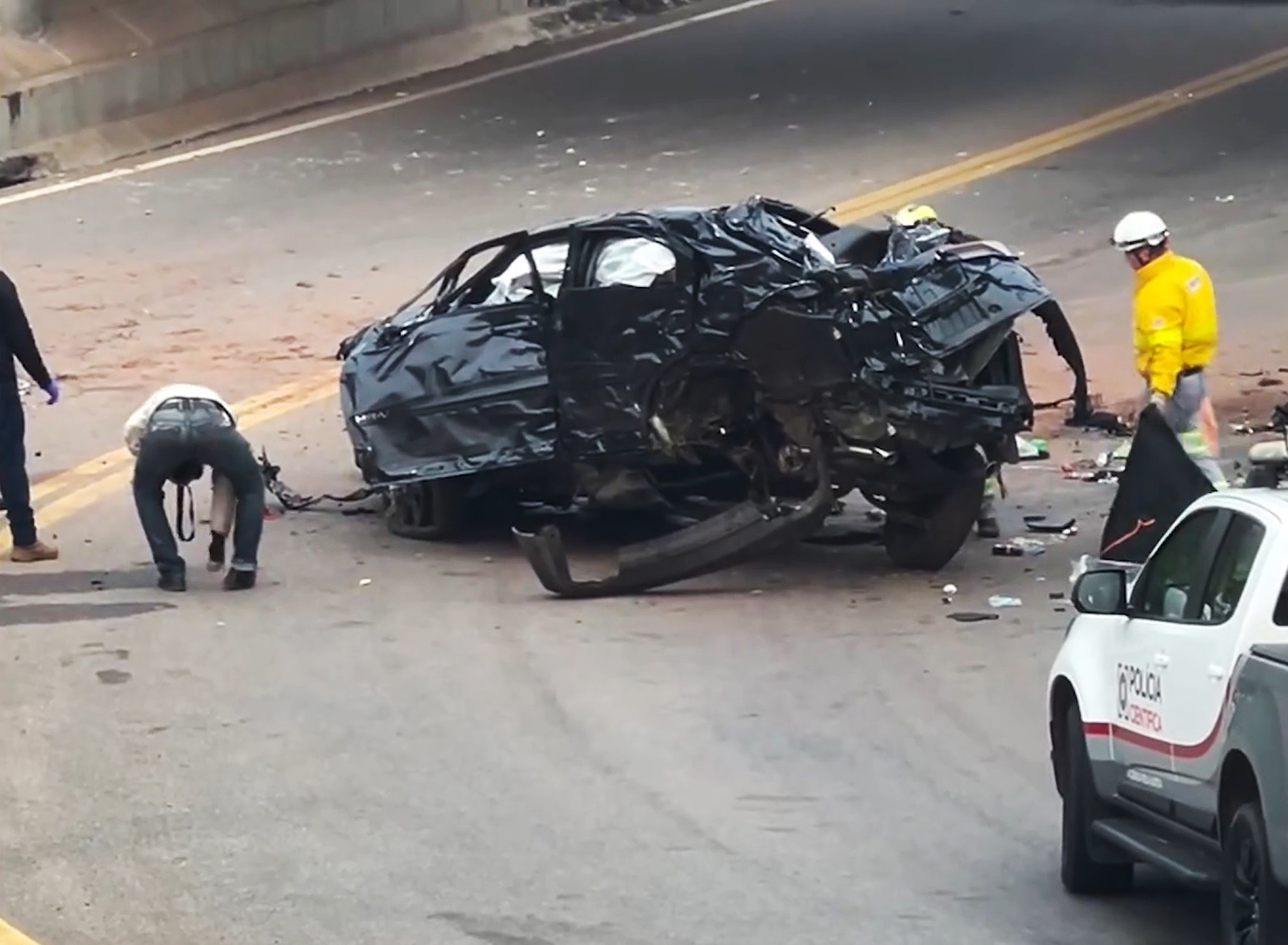 Picture shows the family car at the incident scene, undated. Rogerio Goncalves de Sousa and Alessandra Crisostomo de Sousa died in a car crash in Mococa, Sao Paulo, Brazil. Note: Picture is a screenshot from video. family car
