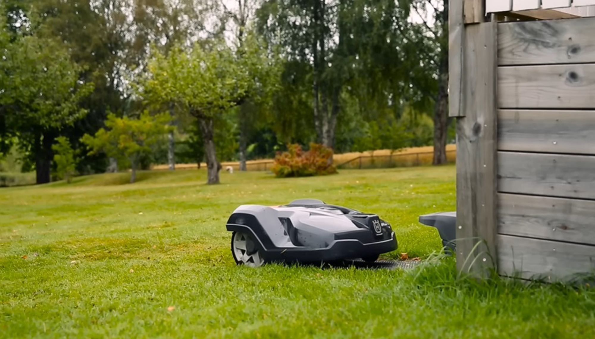 Illustrative image shows a robotic lawn mower, undated. Note: Image is a screenshot from video. Illustrative image shows a robotic lawn mower