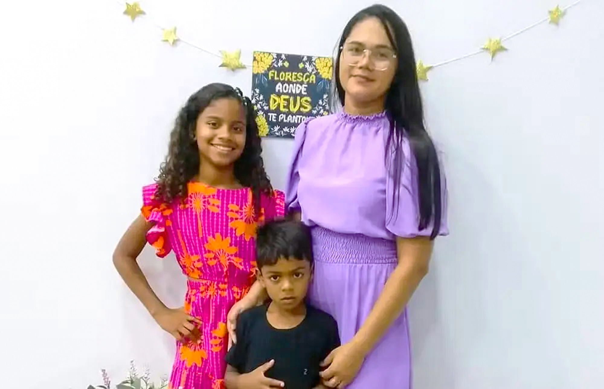 Picture shows Luis Fernando Rocha Silva, 7, his mother, Mirian Lira, 32, and his sister, Evelyn Fernanda, 13. Luis Fernando died after eating a poisoned Easter egg and his mother and sister are in critical condition in Imperatriz, Brazil. Note: Private photo taken from local media. Luis Fernando Rocha Silva, 7, his mother, Mirian Lira, 32, and his sister, Evelyn Fernanda, 13.