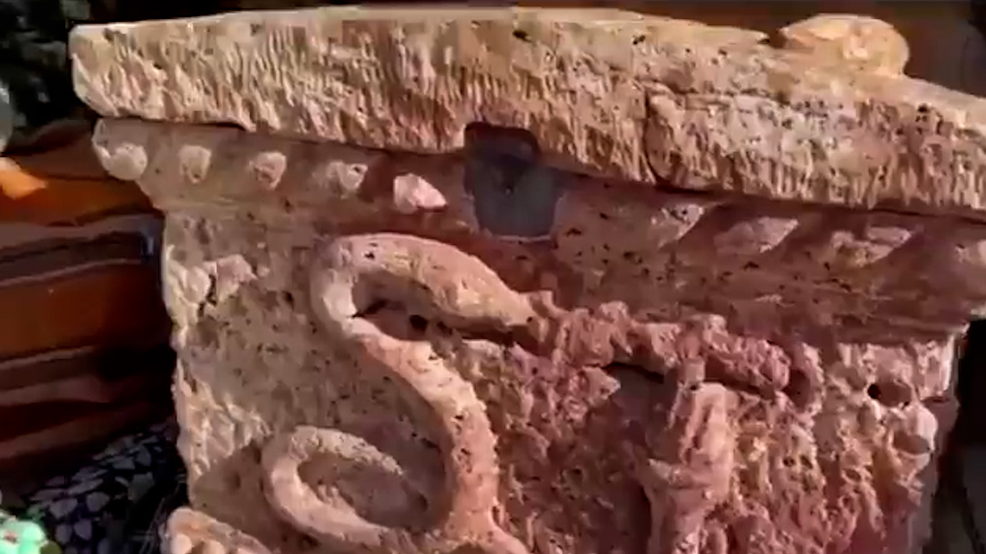 Police seize mini sarcophagus thought to date back to the Roman Period in Amasya, Turkey, undated. One person was detained. Note: Photo is a screenshot from a video. Police seize mini sarcophagus