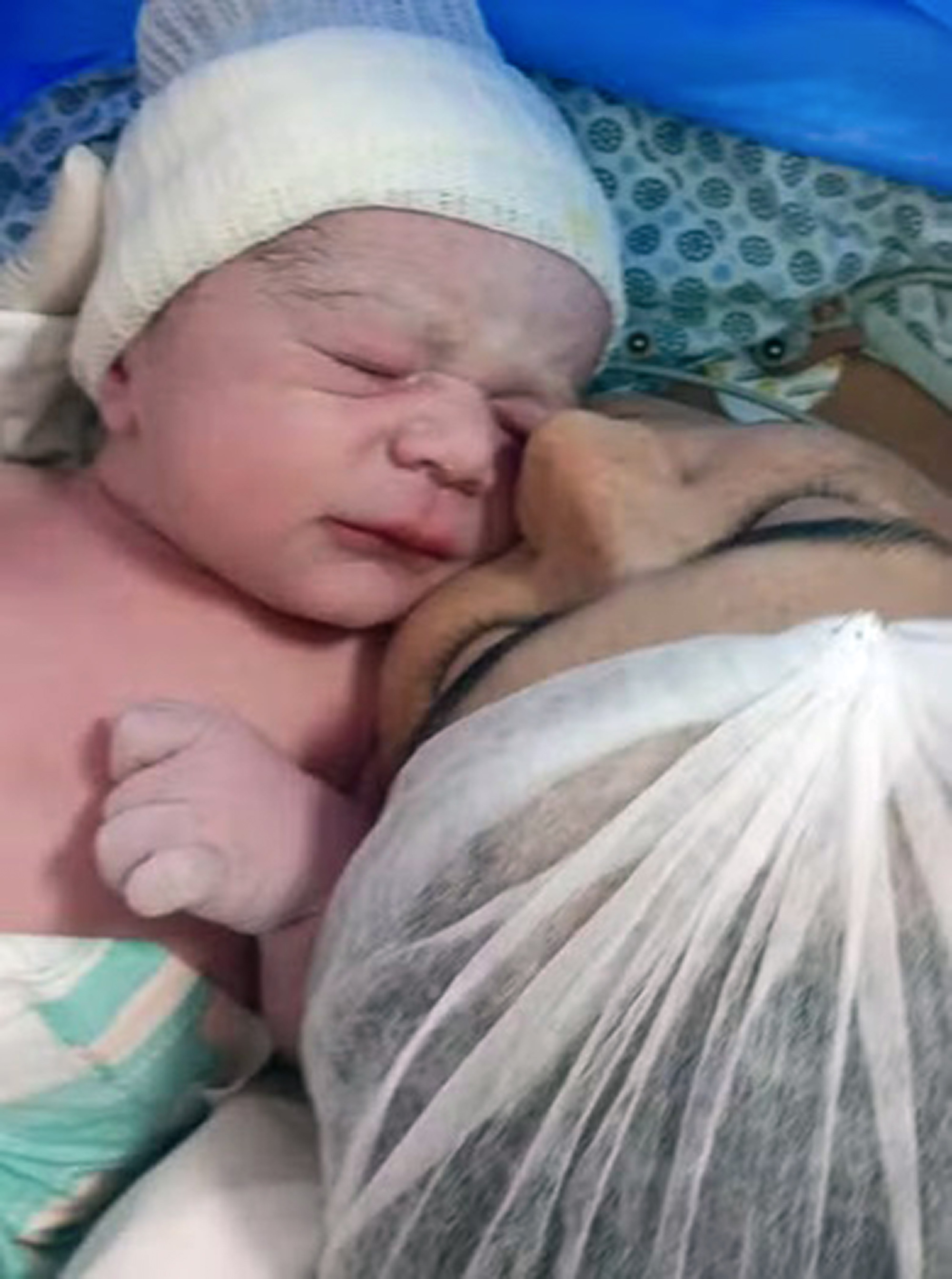 Amanda Porfirio da Silva, 33, with her newborn