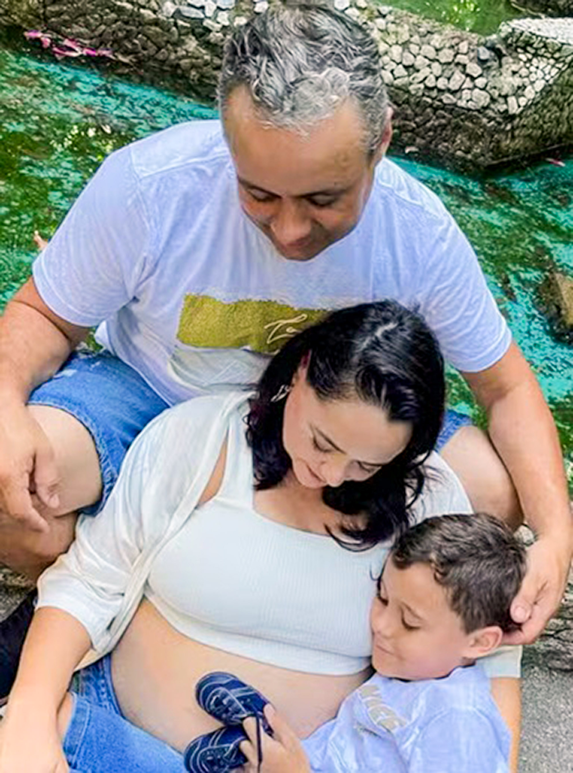 Amanda Porfirio da Silva, 33, her husband Thiago Jusis with their nine-year-old son