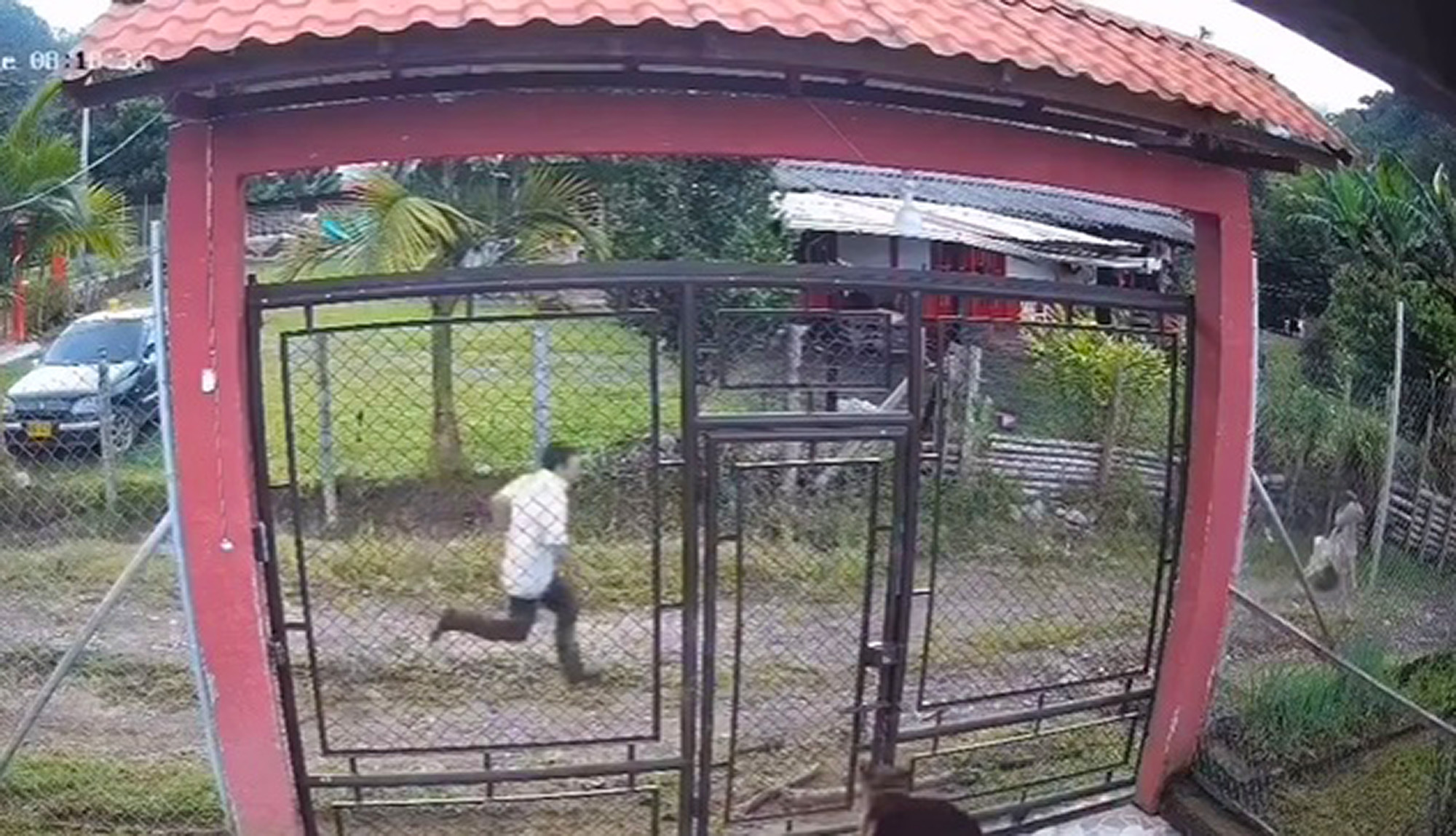 Jose Erley Ramirez Garces runs after his stepdaughter in Chinchina, Colombia. As per the CCTV the incident occurred on April 29, 2025. Note: Image is a screenshot from video. Jose Erley Ramirez Garces