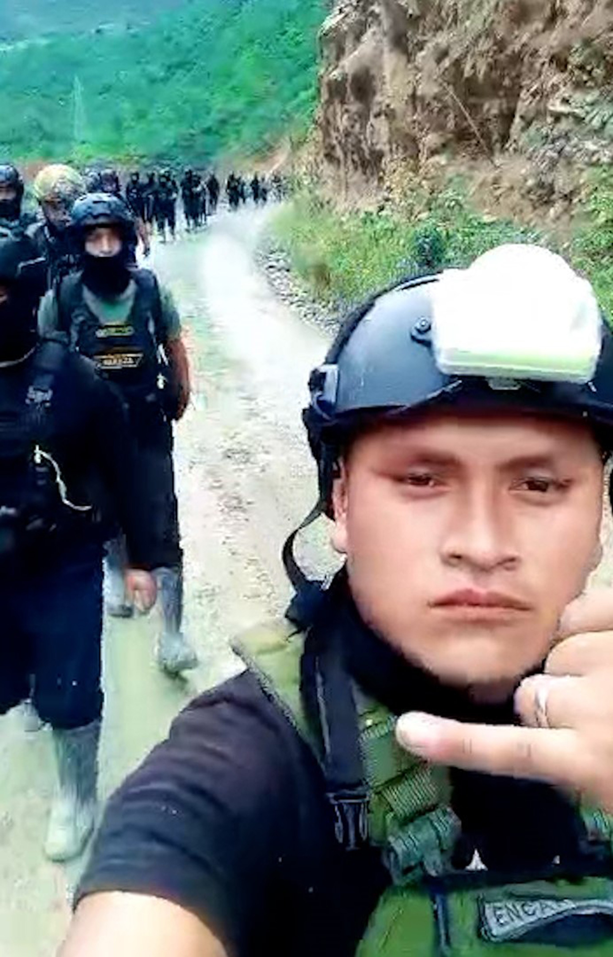 Security officers are seen marching toward their destination