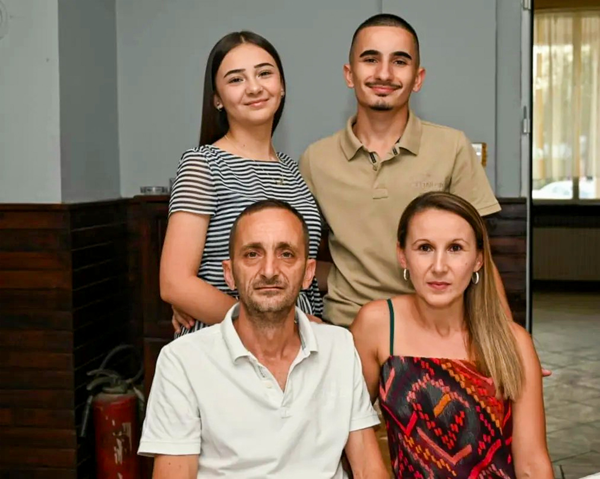 Nikola Jokic (bottom left) poses with his son Filip Jokic (upper right), his wife Olivera Jokic (bottom right) and a family member, undated