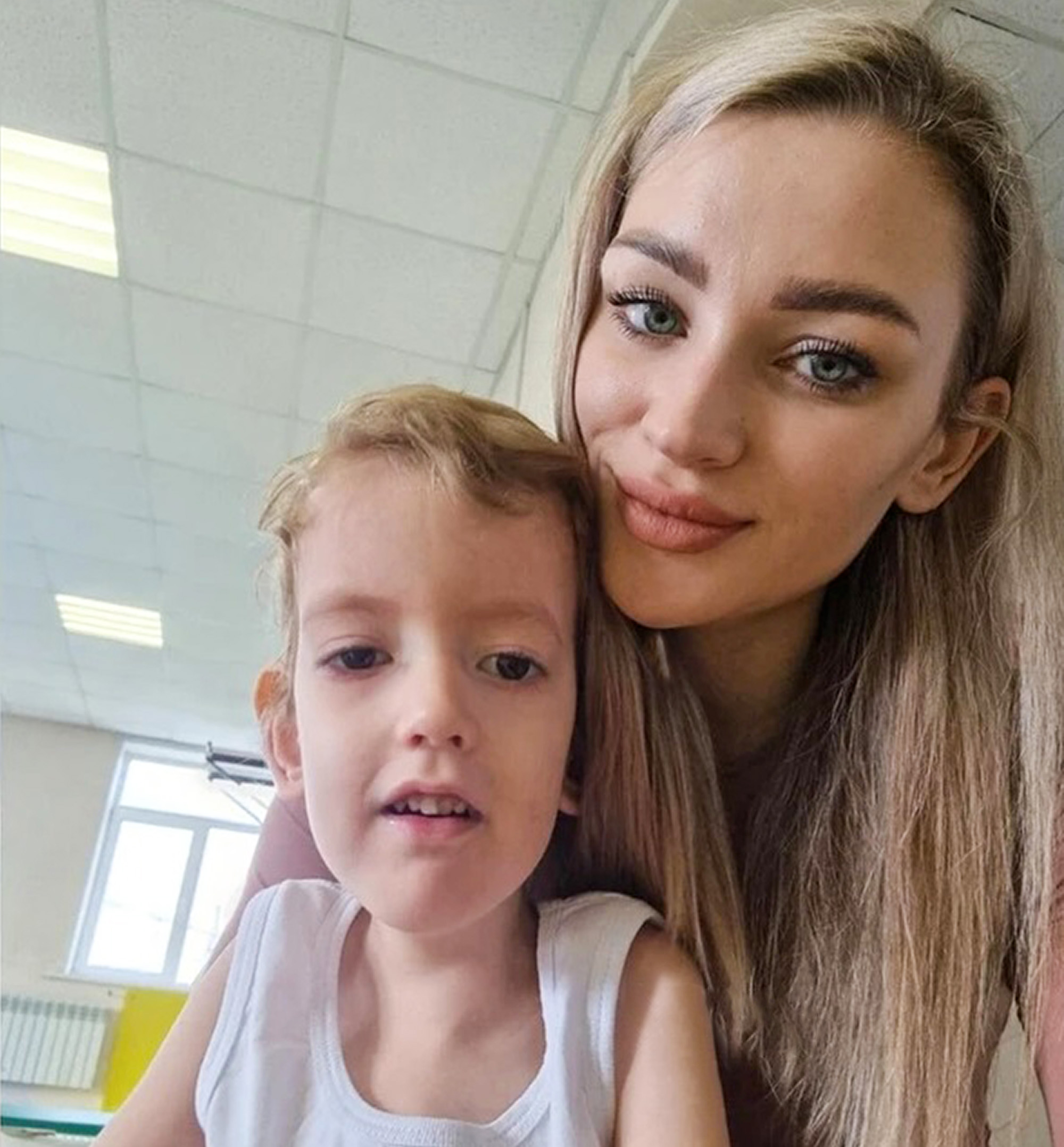 Picture shows Sasha Dzhanelidze with his mother Karolina, undated. He died in the Amur Regional Children's Hospital, Russia, in May 2023. Note: Private photo taken from local media. Sasha Dzhanelidze with his mother Karolina