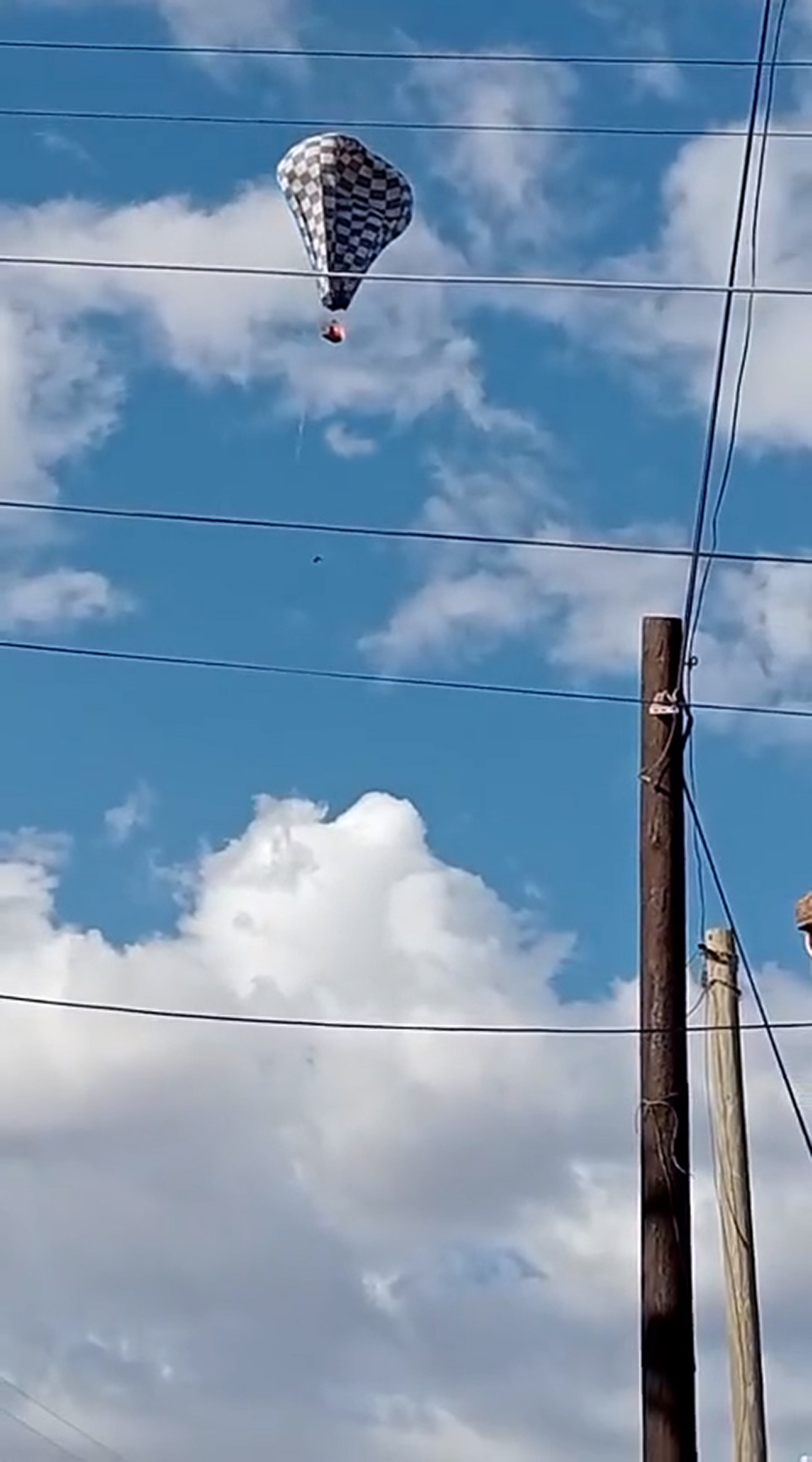 A hot air balloon catches fire during a festival in Enrique Estrada, Mexico, undated. A person died after jumping into the void. Note: Photo is a screenshot from a video. A hot air balloon catches fire during a festival in Enrique Estrada