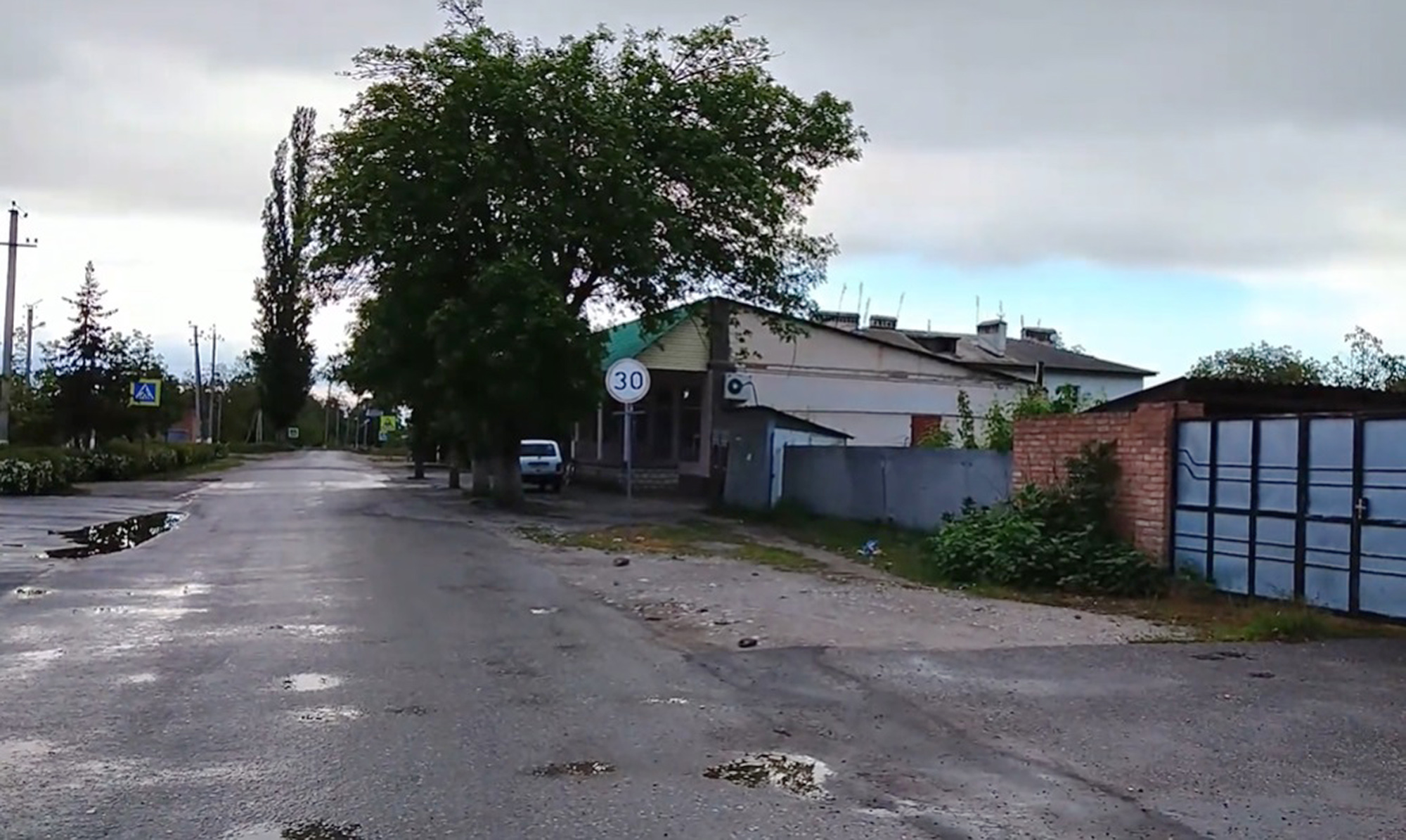 Photo shows a street in the village of Priblizhnaya in Kabardino-Balkaria, Russia, where the school is located and a girl died after being hit in the eye by a javellin. The picture is undated. Note: Image is a screenshot from video. Photo shows a street in the village of Priblizhnaya