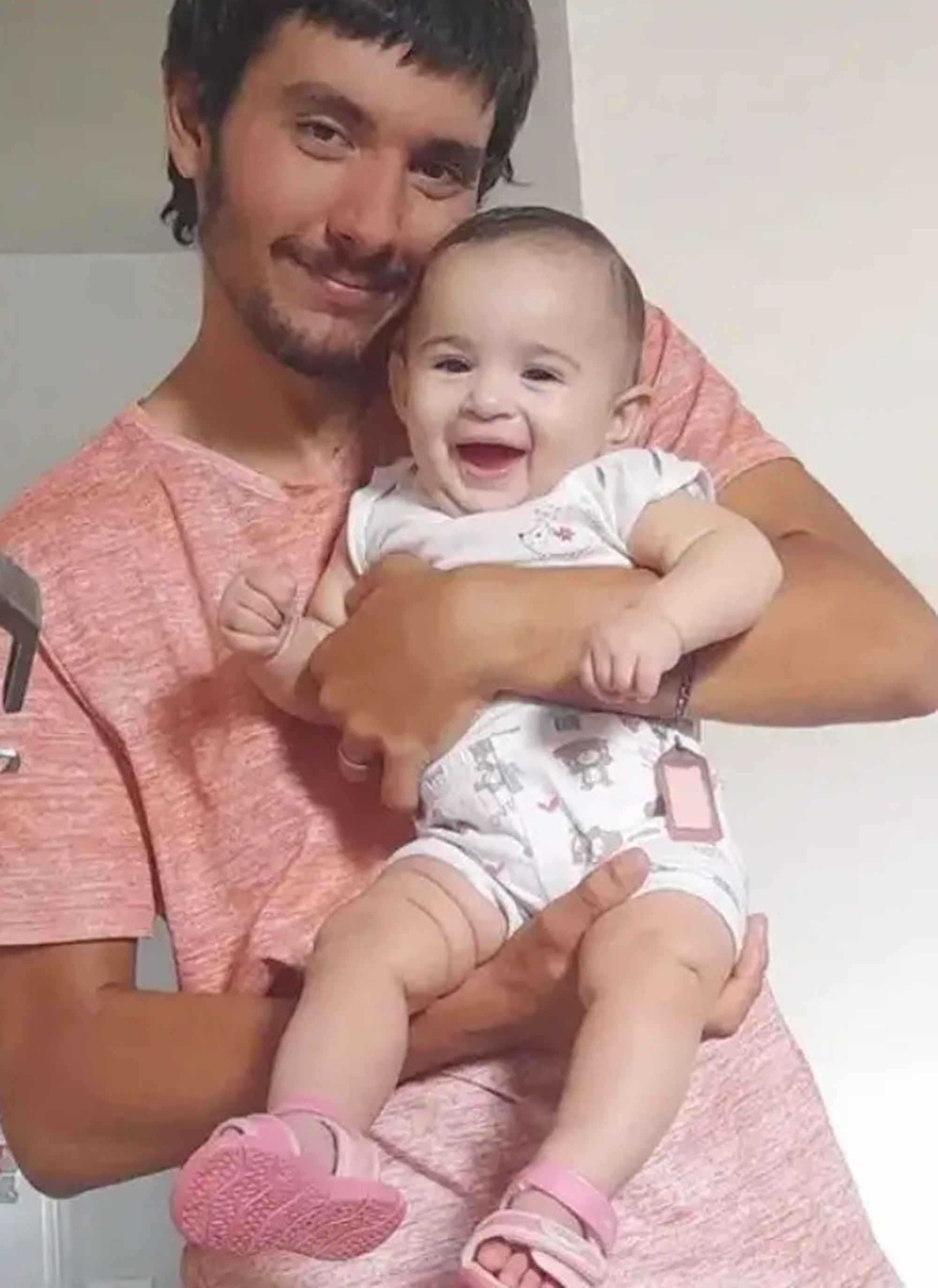 Picture shows Joao Augusto Borges de Almeida, 21, and his little daughter Sophie Eugenia Borges, undated. He killed Sophie and his wife Vanessa Eugenio Medeiros in Campo Grande, Brazil, on May 26, 2025. Note: Private photo taken from local media. Joao Augusto Borges de Almeida, 21, and his little daughter Sophie Eugenia Borges