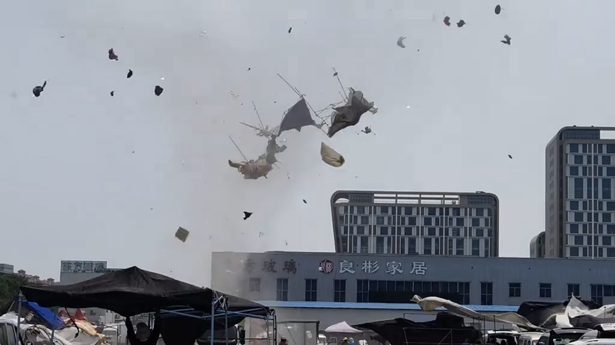 Mini tornado hits market in Yantai, Shandong Province, China, on May 27, 2025. Witnesses said it lasted for about a minute. Note: Photo is a screenshot from a video. Mini tornado
