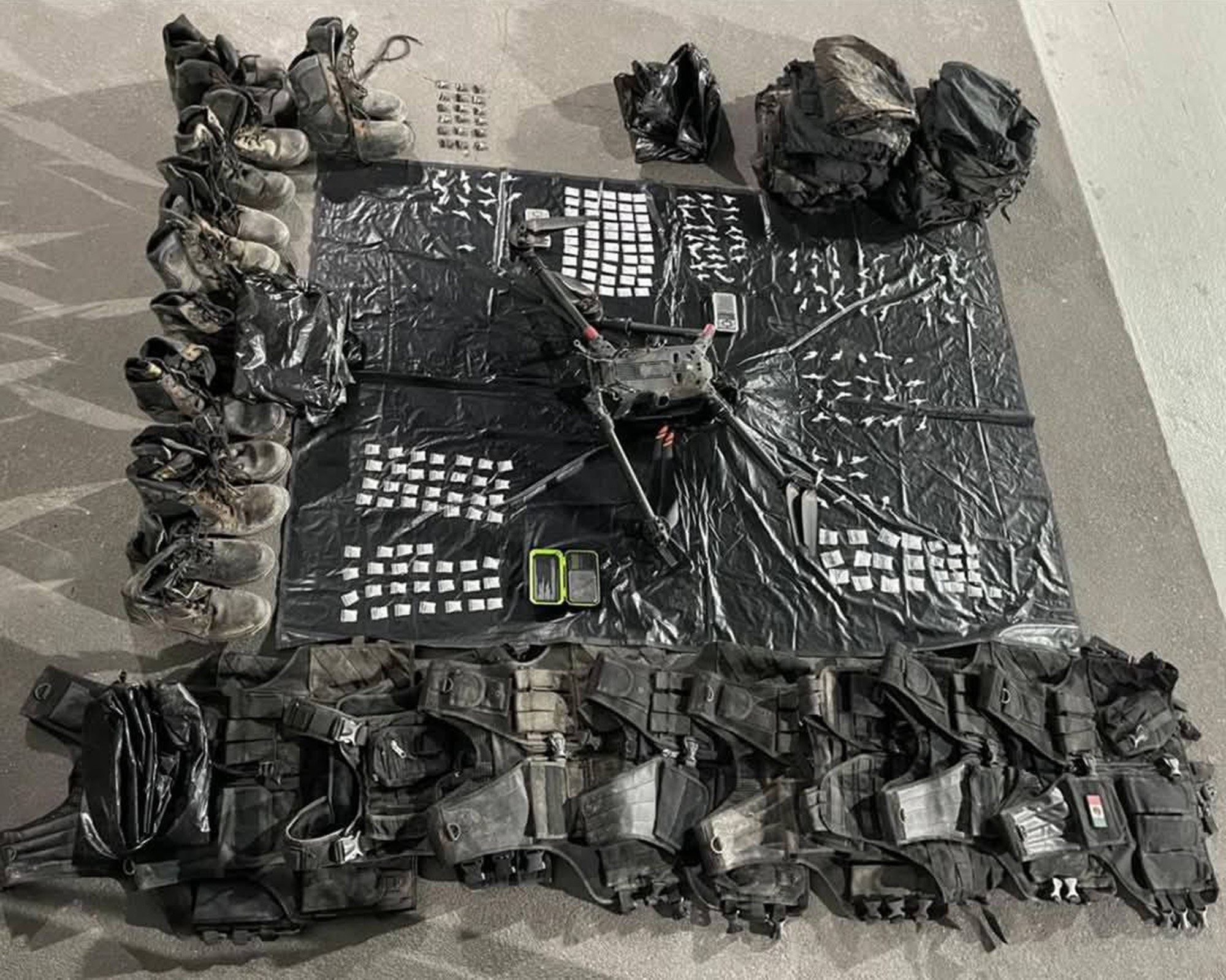 Picture shows the seized items, undated. A 19-year-old man named Brad Pitt was captured and found with weapons and drugs in his possession in Monterrey, Mexico. Note: Police photo taken from social media. the seized items