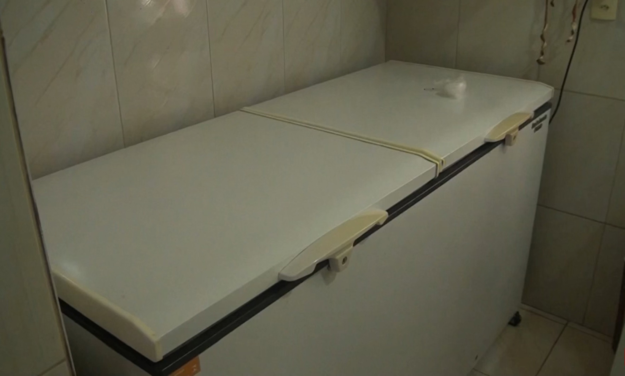 Picture shows the freezer in which Claudia Tavares Hoeckler hid the body, undated. She turned herself in voluntarily in the Chapeco Women's Penitentiary, Brazil, on May 31, 2025. Note: Image is a screenshot from video. freezer