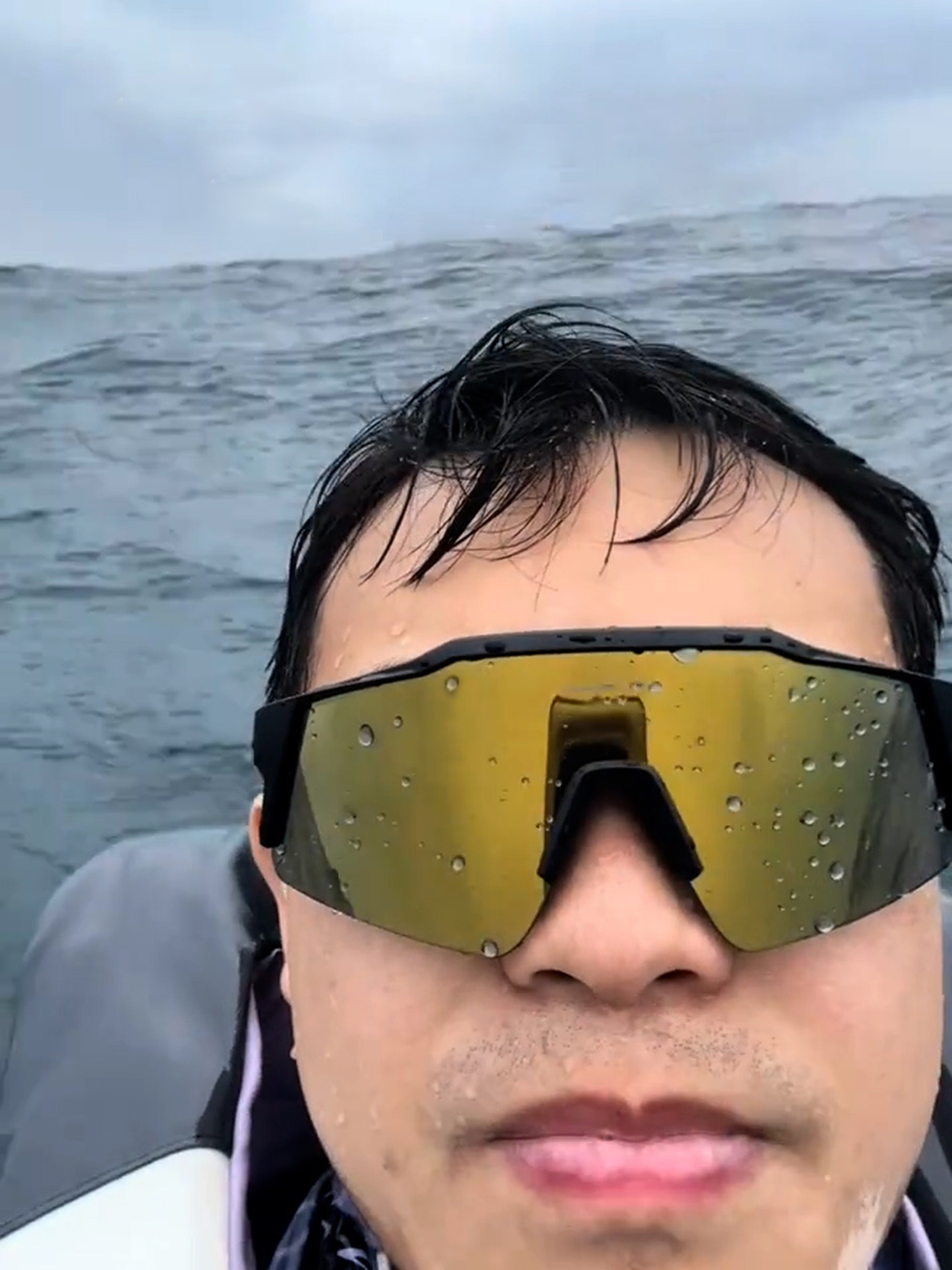Video shows the man in the water after being knocked over by the waves while kayaking in the waters of Wanshan District of Zhuhai in China, May 25, 2025. Fortunately he was wearing a life-jacket. Note: Photo is a screenshot from a video. the man in the water