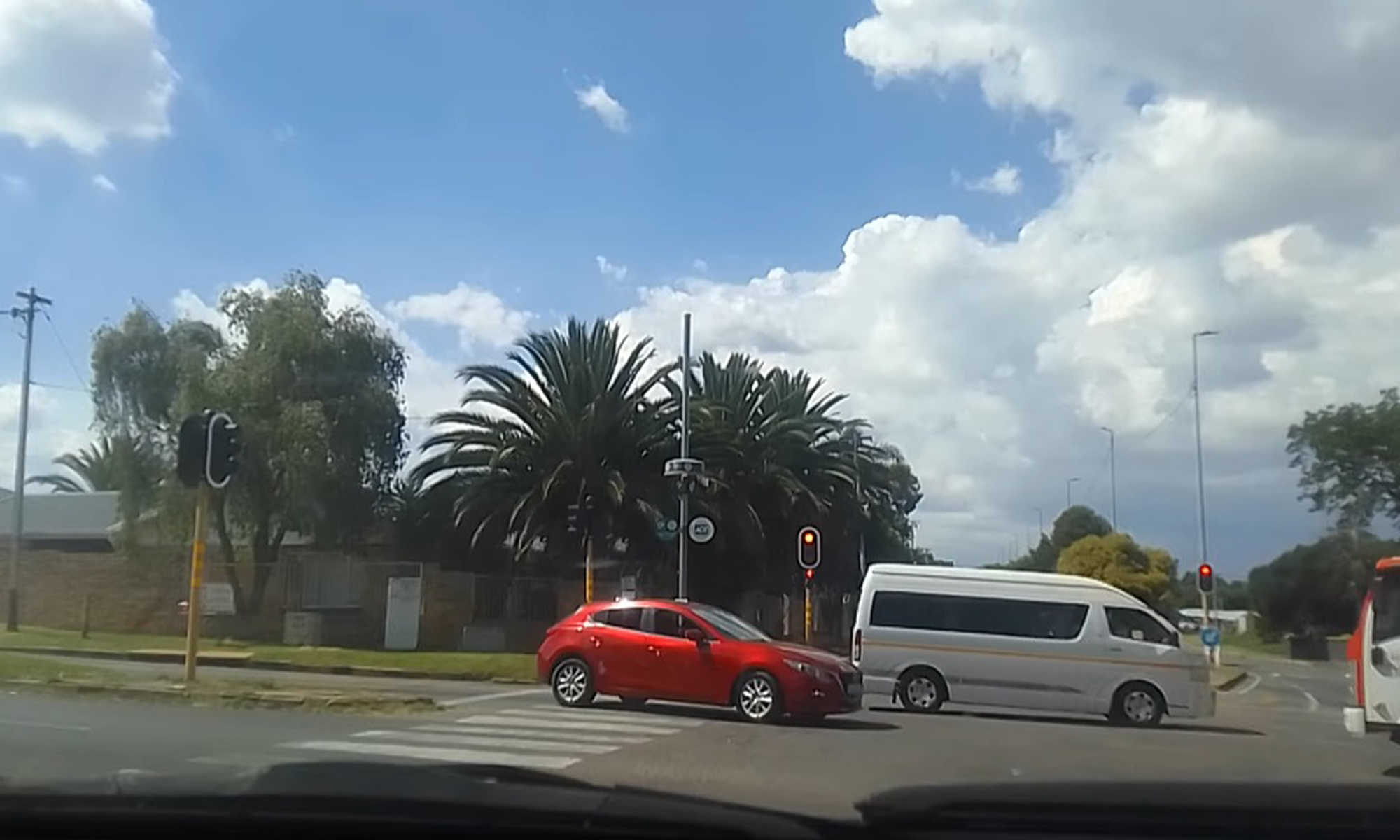 Illustrative image shows a street in Roodepoort, South Africa, undated. Note: Image is a screenshot from video. street in Roodepoort