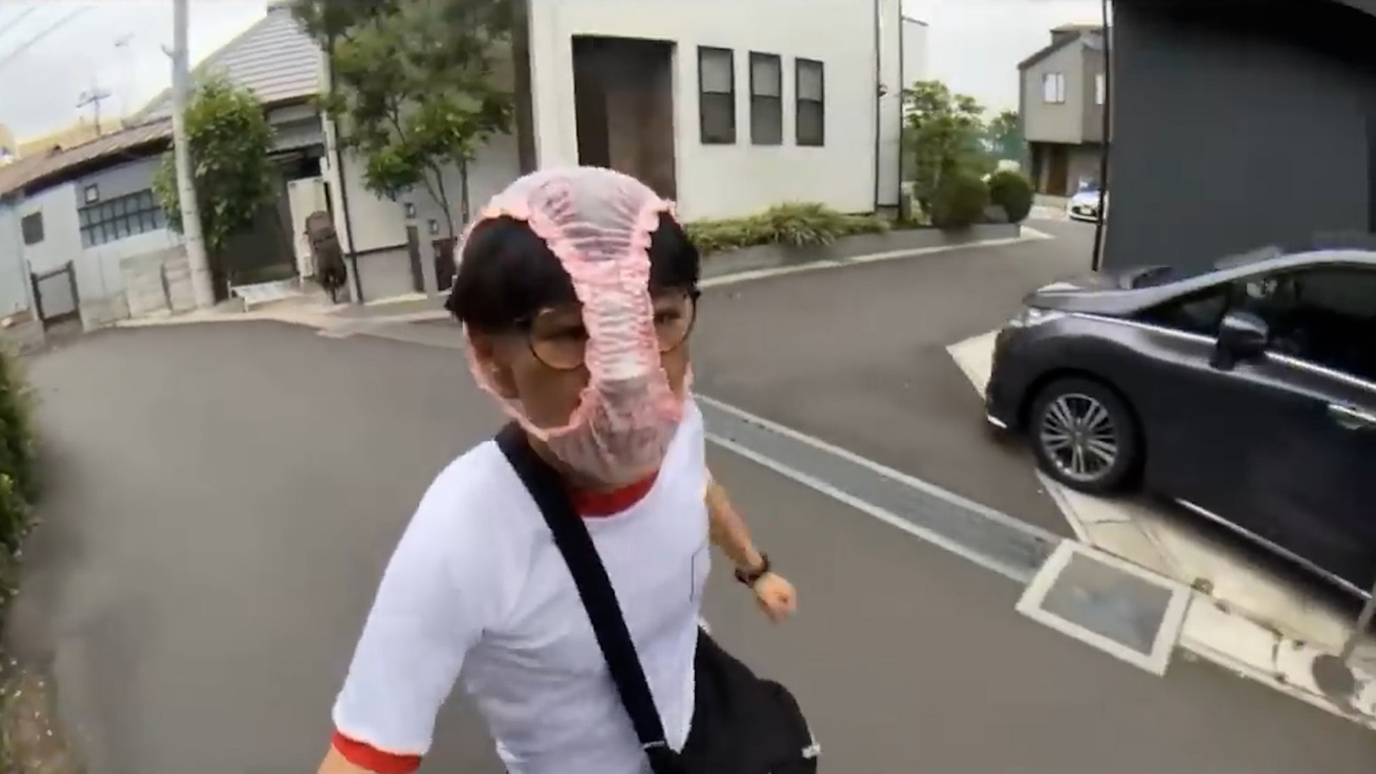 Japanese streamer wears women’s underwear on his head to boost views in Chiba Prefecture, Japan, May 19, 2025. He was arrested. Note: Photo is a screenshot from a video. Japanese streamer