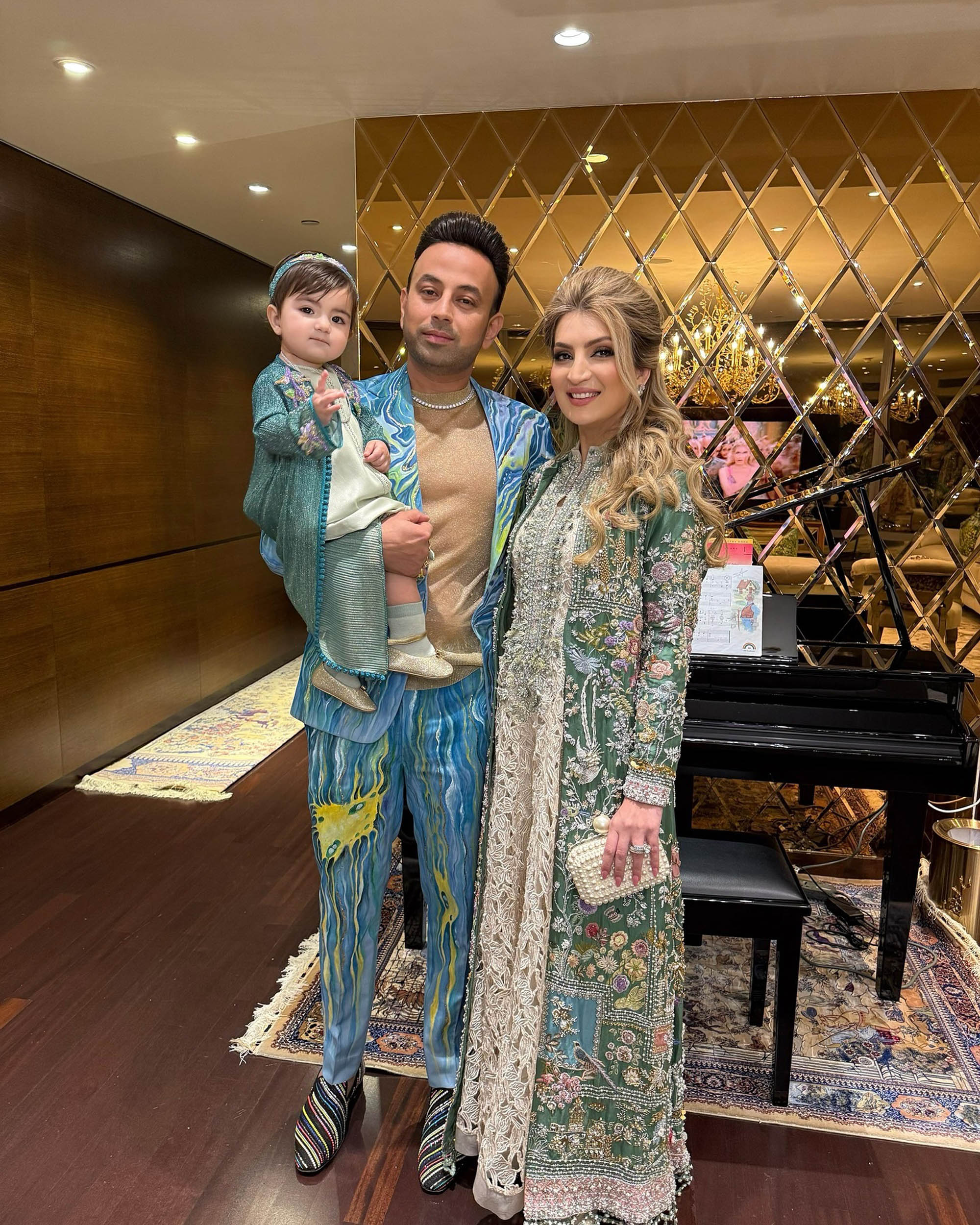 Indian businessman Satish Sanpal poses with family in undated photo. He gifted his one-year-old daughter, Isabella, a custom pink Rolls-Royce in Dubai. Note: Private photo taken from social media. Satish Sanpal poses with family