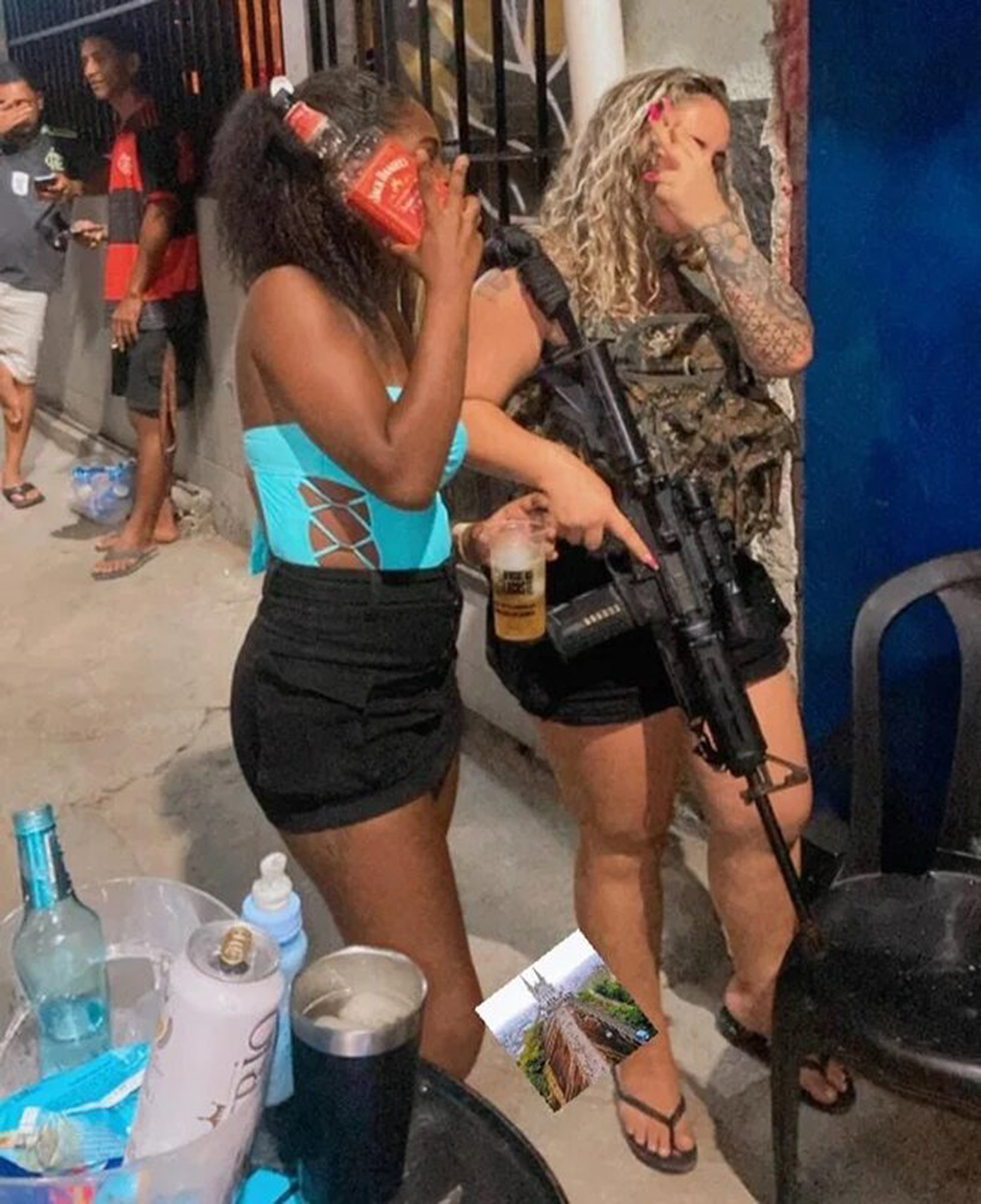 Picture shows Diaba Loira (right), undated. She is wanted after breaking with the Comando Vermelho and aligning herself with another fraction in Rio de Janeiro, Brazil. Note: Private photo. Diaba Loira