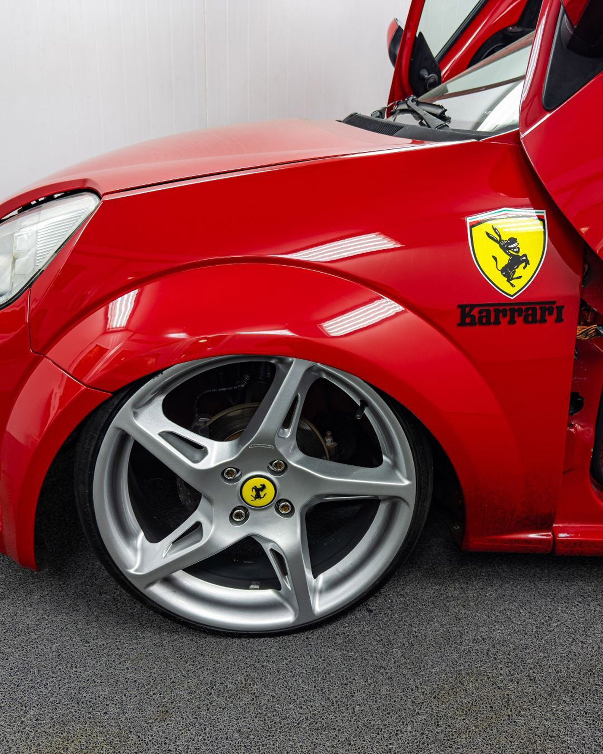 Picture shows the transformed "Ferrari", undated. Daniel dos Santos modified a Ford Ka into a "Ferrari" in Sao Paulo, Brazil. Note: Private photo. Picture shows the transformed "Ferrari"