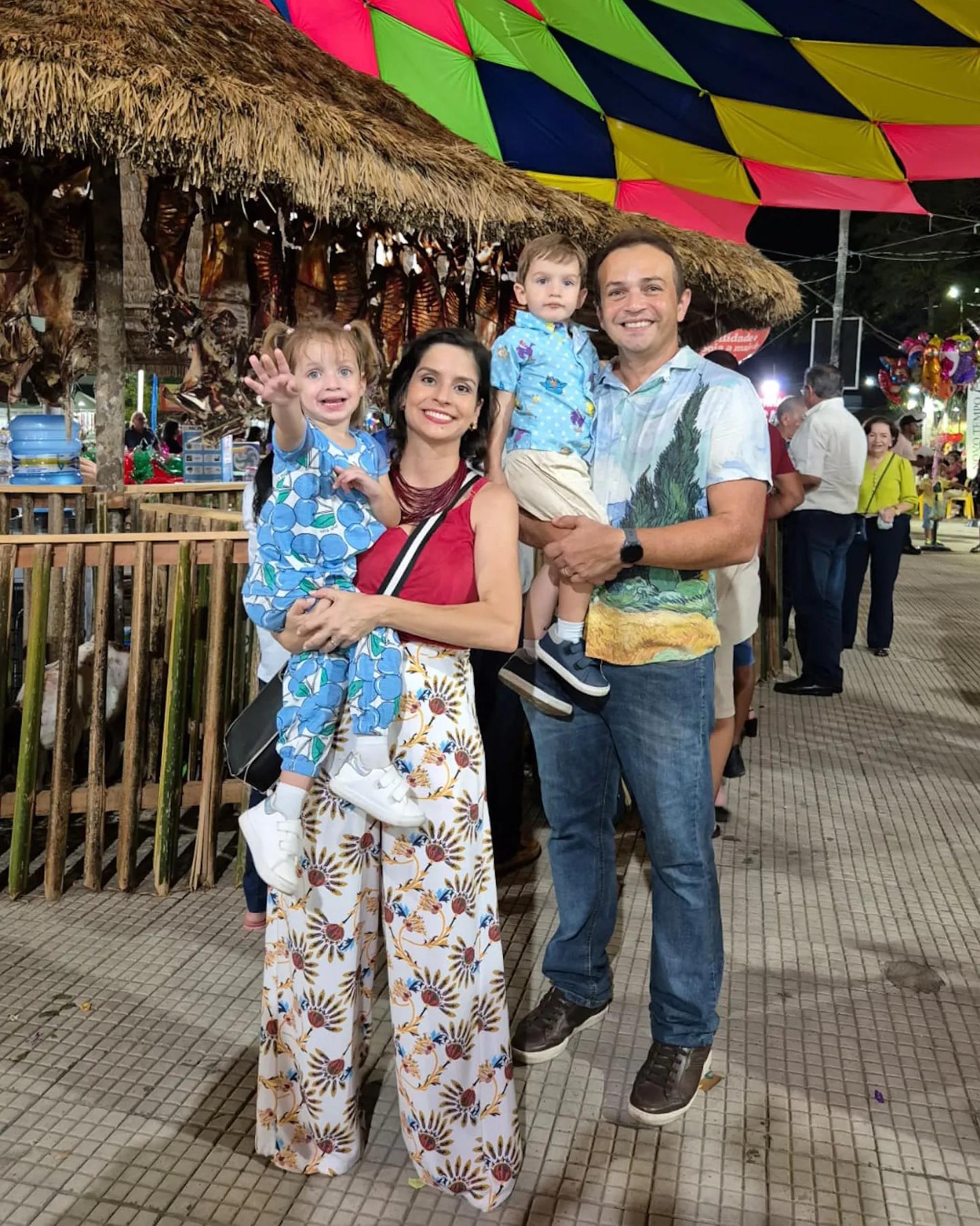 Alice Brasil Souza da Paz with her family