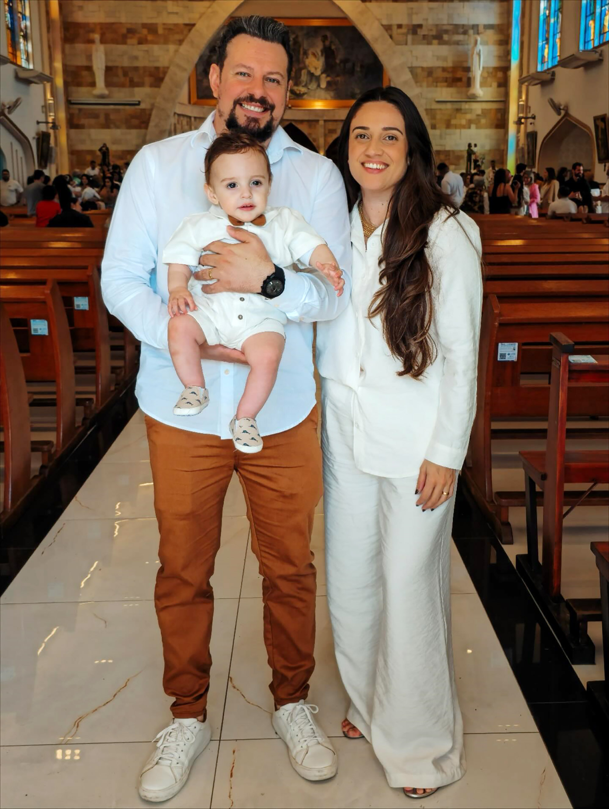 Jean Carlos Mangeronio de Freitas, 38, poses with family in undated photo. He died crushed by marble stone in Tubarao, Brazil. Note: Private photo taken from social media. Jean Carlos Mangeronio de Freitas, 38, poses with family