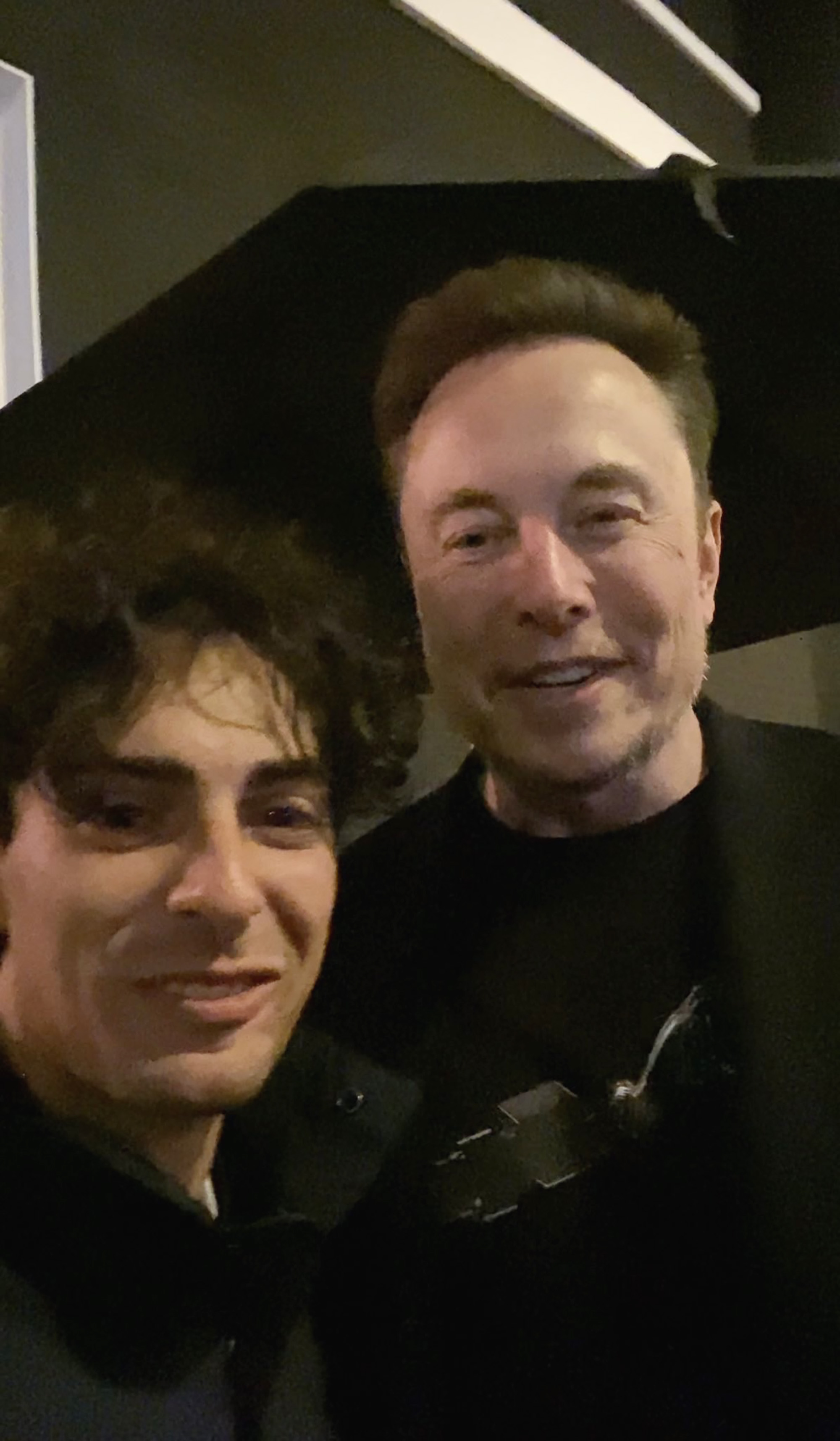 Andrea Stroppa poses with Elon Musk, undated. 