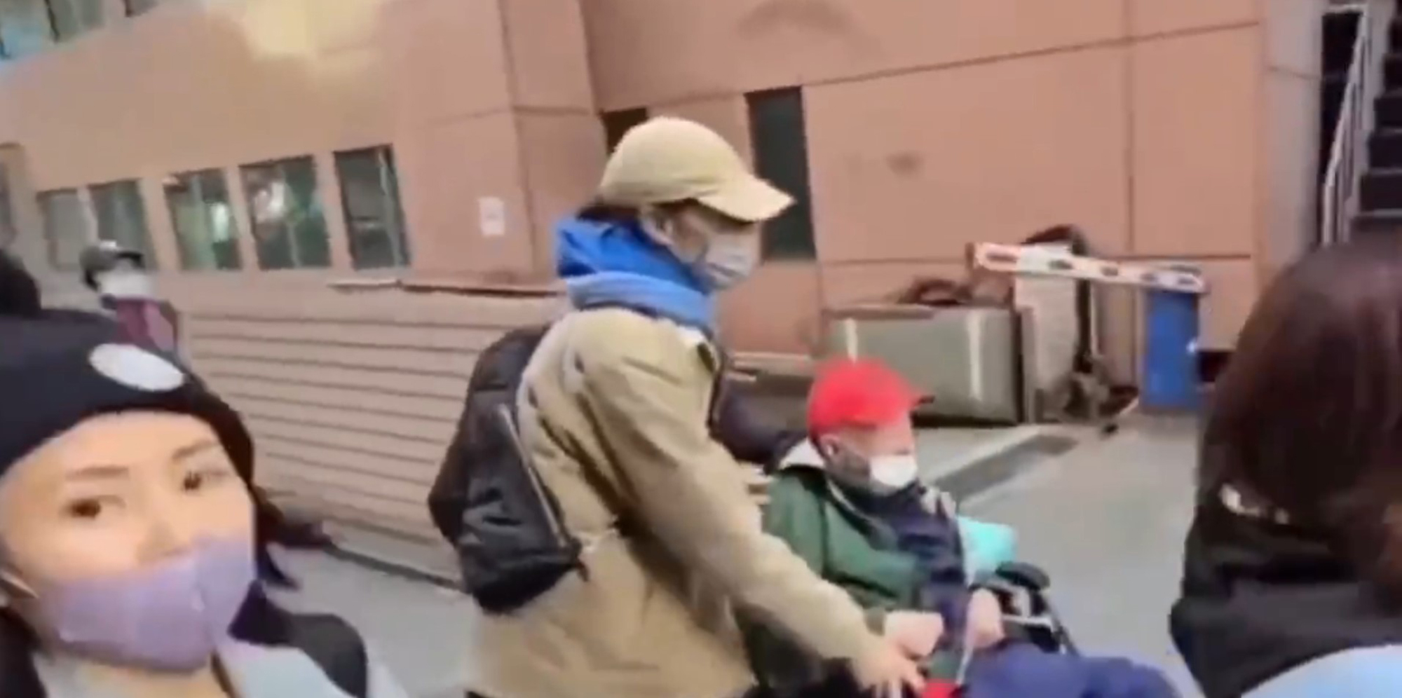 Family raids hospital to rescue 102-year-old tycoon from his caregiver in Taipei, Taiwan, Feb. 3, 2026. Note: Photo is a screenshot from the video Family raids hospital to rescue 102-year-old tycoon from his caregiver in Taipei