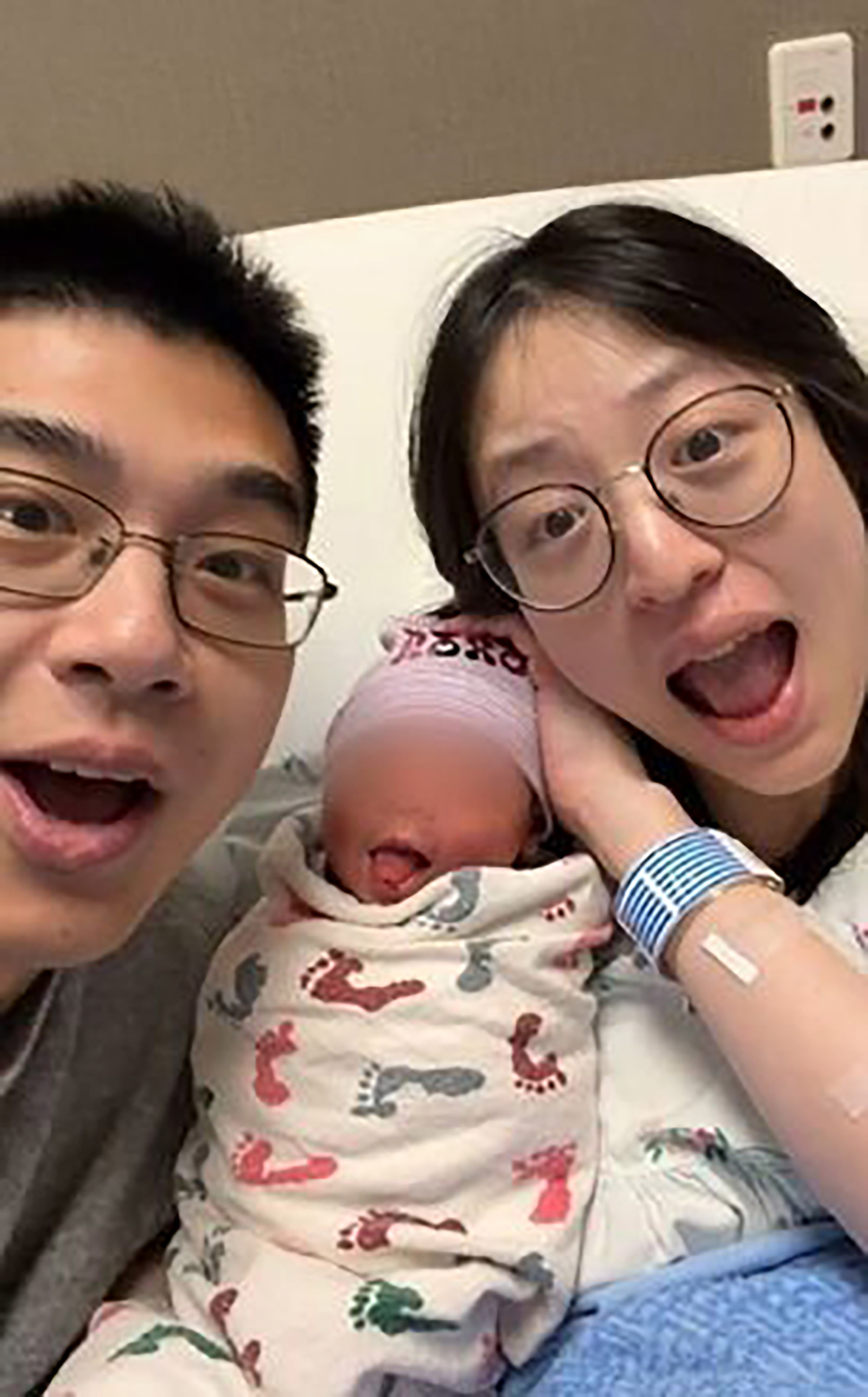 Picture shows the influencer known as "Paul in USA" with wife and baby, undated. He filmed and uploaded a video of his wife's childbirth. Note: Private photo. Picture shows the influencer known as "Paul in USA"