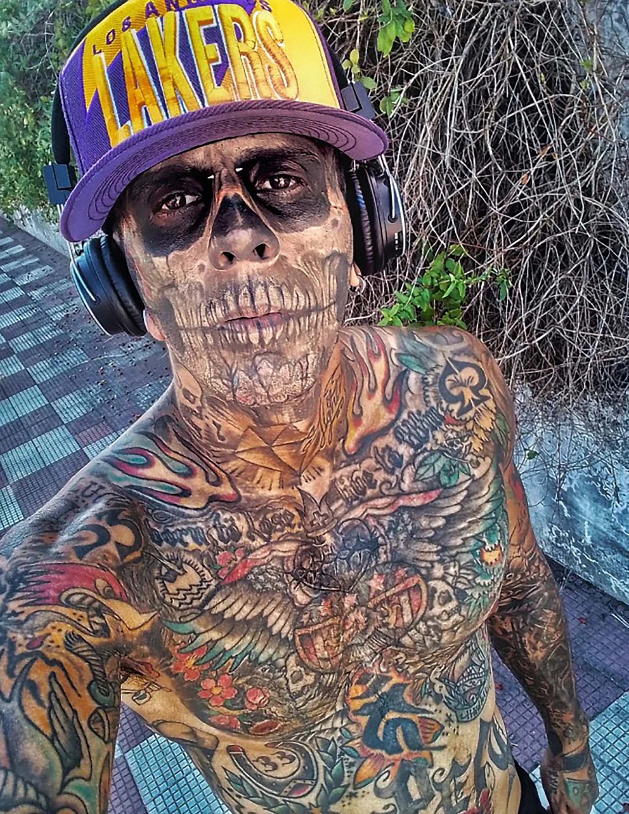 Leandro de Souza from the city of Bage, Rio Grande do Sul State, Brazil, poses in undated photo. He is undergoing laser treatments to remove the tattoos from his face. 1747164928838-7ygfdz24.jpg