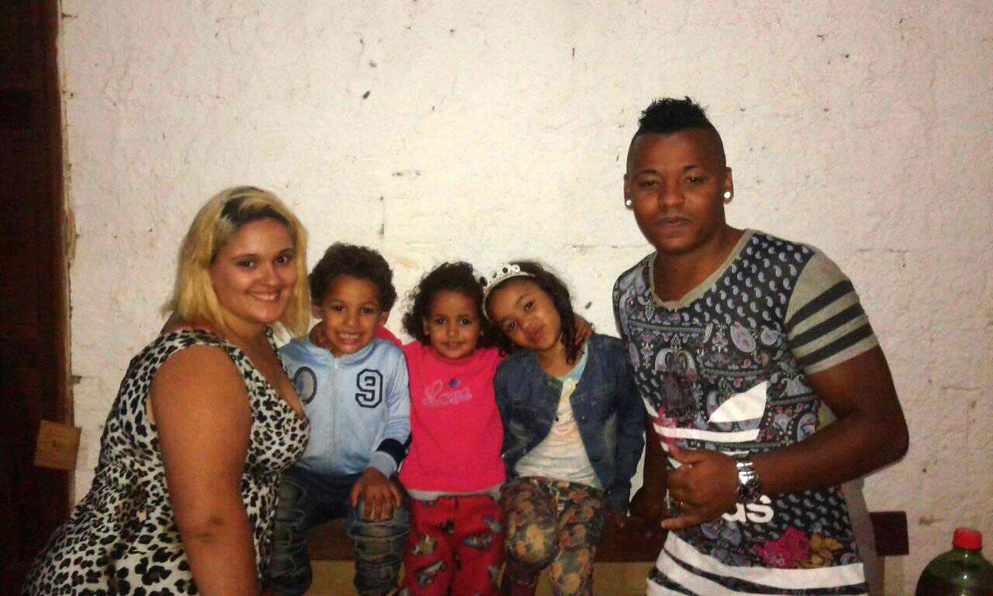 The father David da Silva Lemos, 28, and mother Thays da Silva Antunes pose with three of their kids in undated photo. Their father was arrested on suspicion of having killed the four children in Alvorada, Brazil, Wednesday, Dec. 14, 2022. 1747244855022-tmhewflg.jpg
