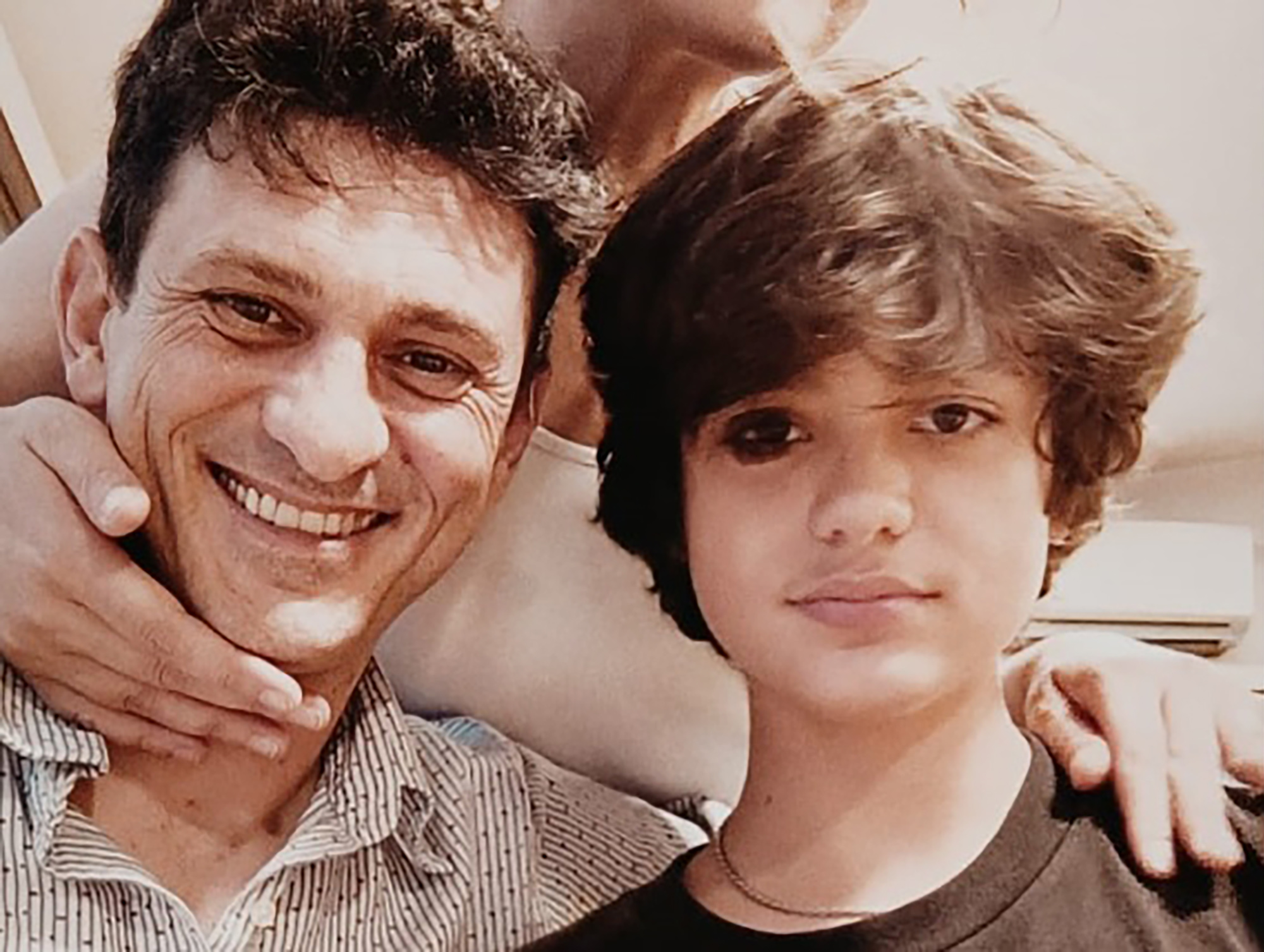 Andrea and Mattia Ahmet Minguzzi pose in undated photo. The 15-year-old son of Italian chef Andrea Minguzzi was stabbed in Kadıkoy, Istanbul, Turkey. Note: Private photo taken from local media. (Newsflash/NX) 1747844511684-o5cixuh5.jpg