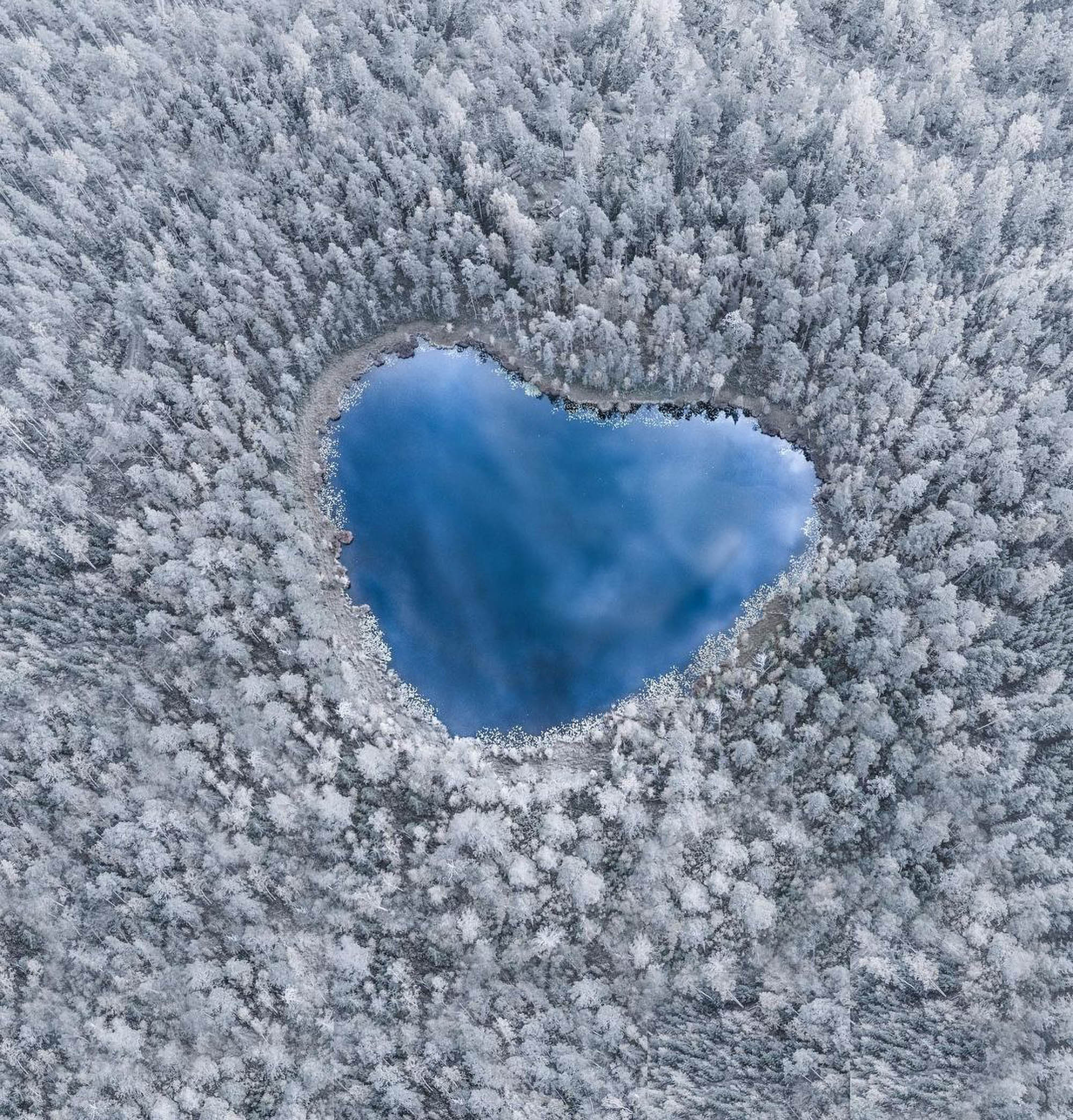 The heart lake in Ostergotland, Sweden photographed by Sophia Bergholm in Summer. Heart-shaped lake in Ostergotland, Sweden